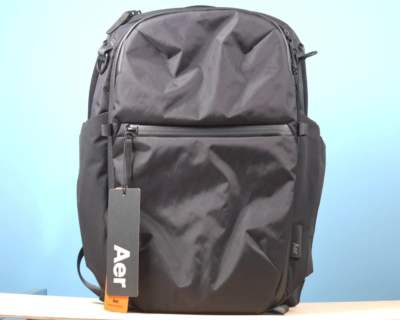 Sac Aer Travel Pack 4 X-Pac 28 L noir, photographié de face par Lureox